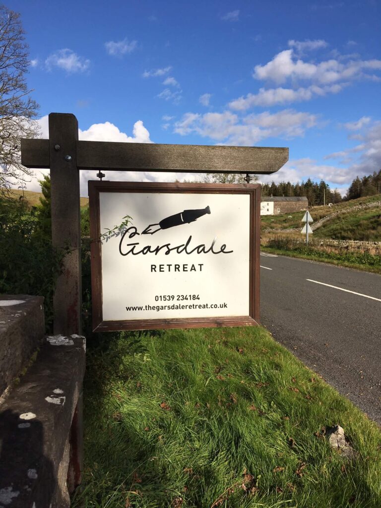 Image: Photograph of The Garsdale Retreat signpost.
