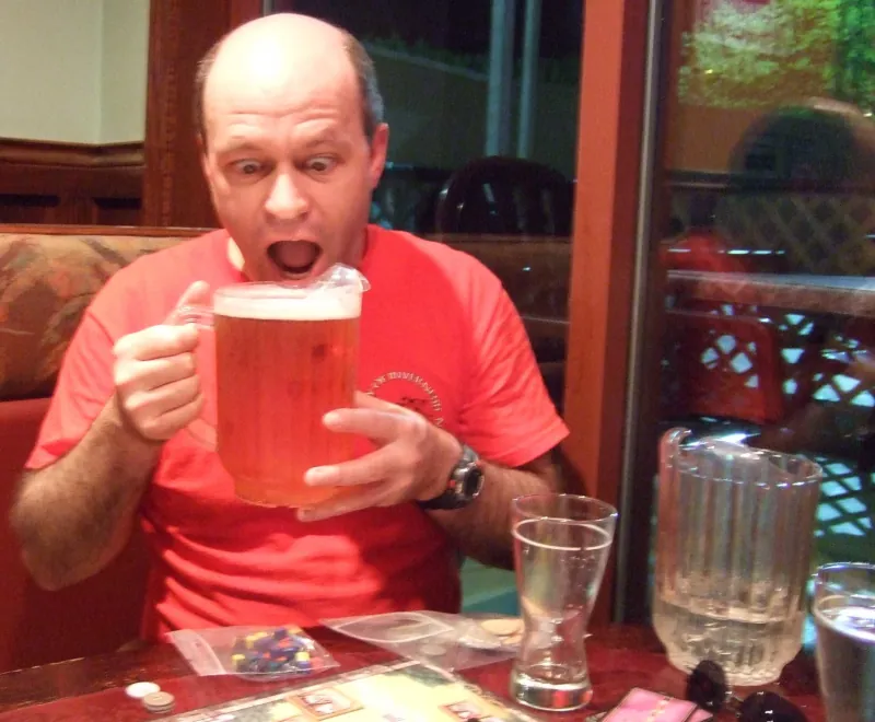 Image: Photograph of Kevin Machin with a jug of beer