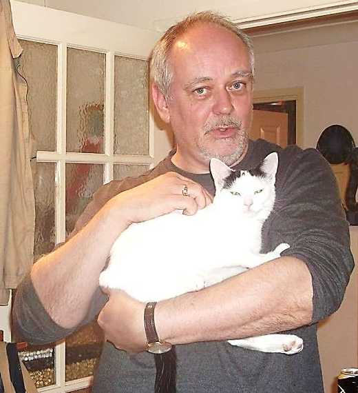 Image: Photograph of Tim Wilson with his cat